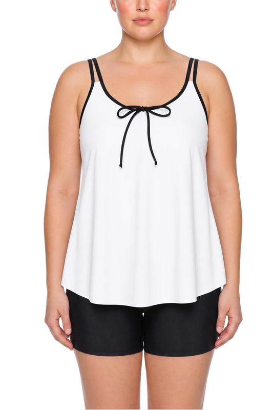 White tankini top with black piping, tie-front, double straps, and black boyshort bottoms.