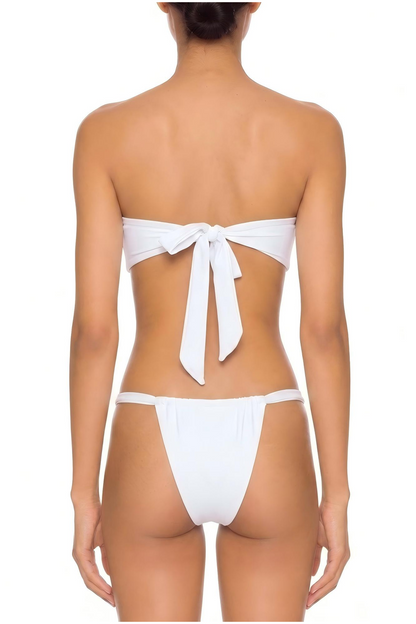 Back view of a white two-piece bikini featuring a strapless tie-back bandeau top and tie-side bottoms.