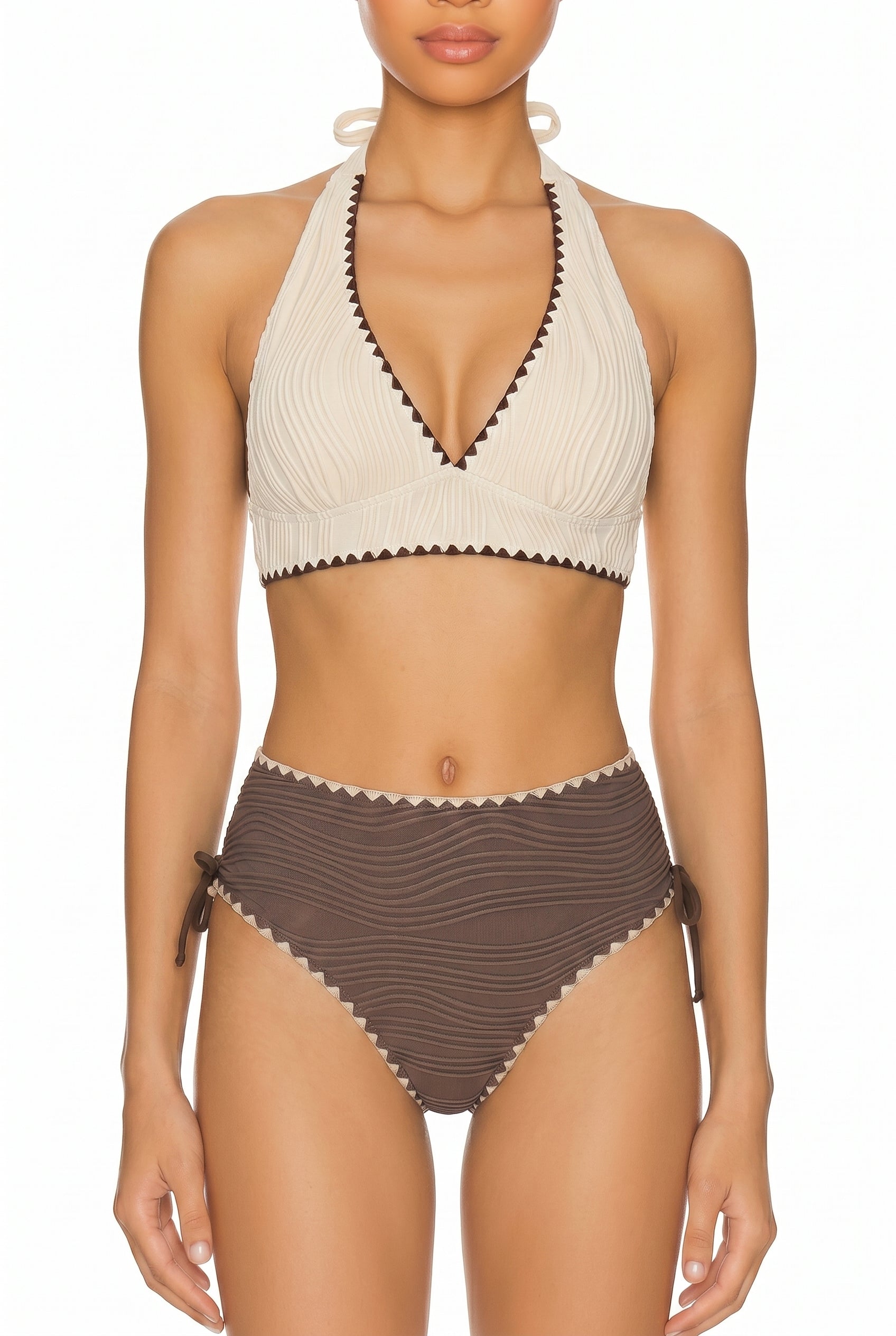 Cream halter bikini top with brown scalloped trim and brown high-waist bottoms on a white background
