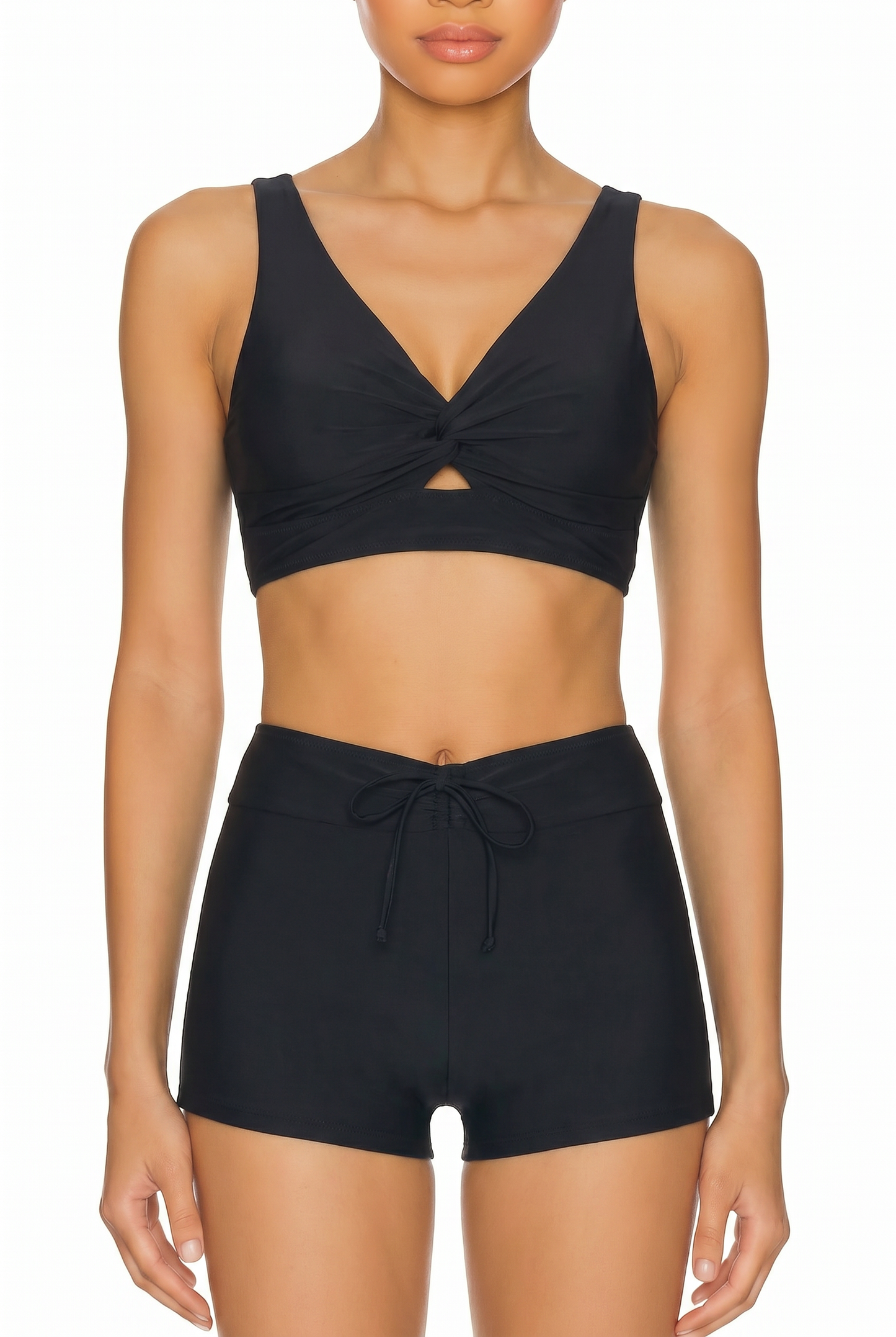 Black two-piece swimsuit with twist-front V-neck top and matching high-waisted shorts, front view on white background